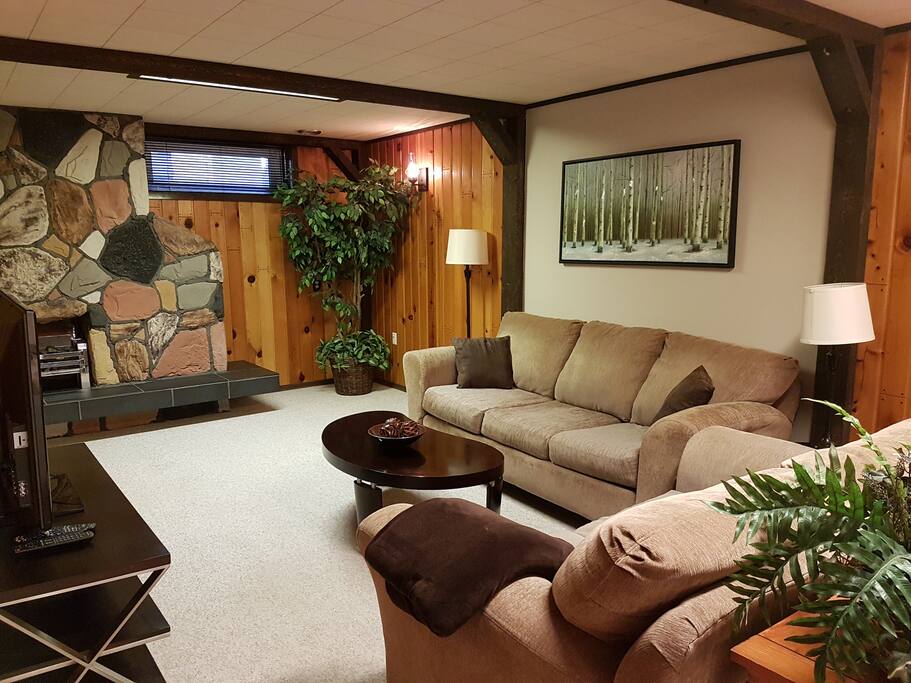 Cozy and spacious living room with electric fire place