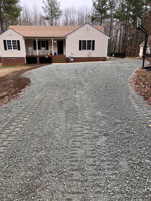 Ample parking area. Rocking chairs in front porch.