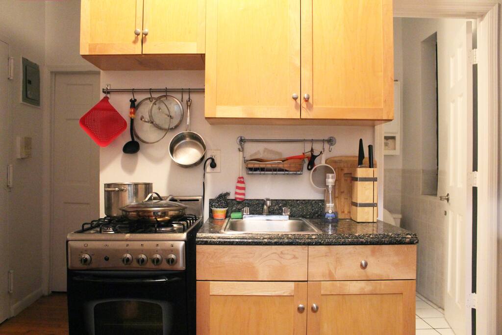 Kitchen. To the left is the way to your room, the right is the bathroom.
