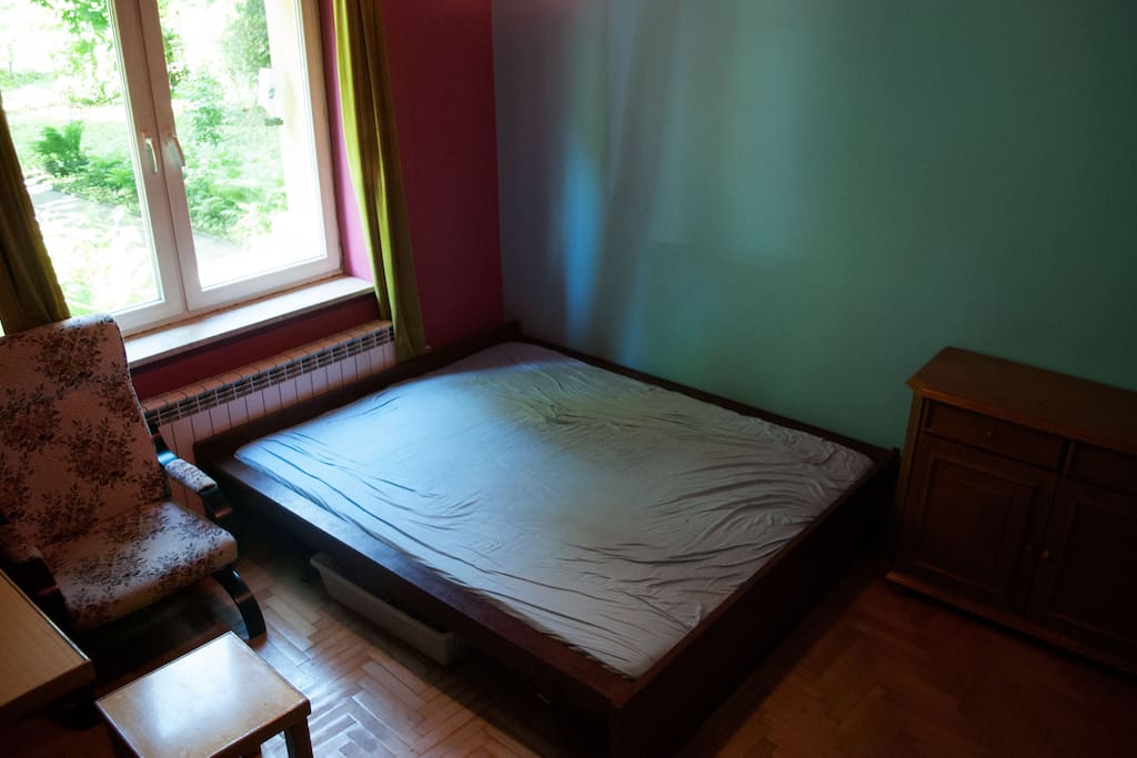 double bedroom with armchair