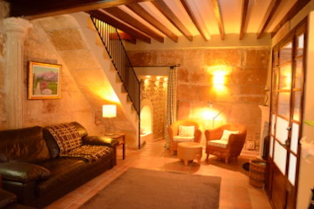 Large comfortable sitting room with a wood-burning stove