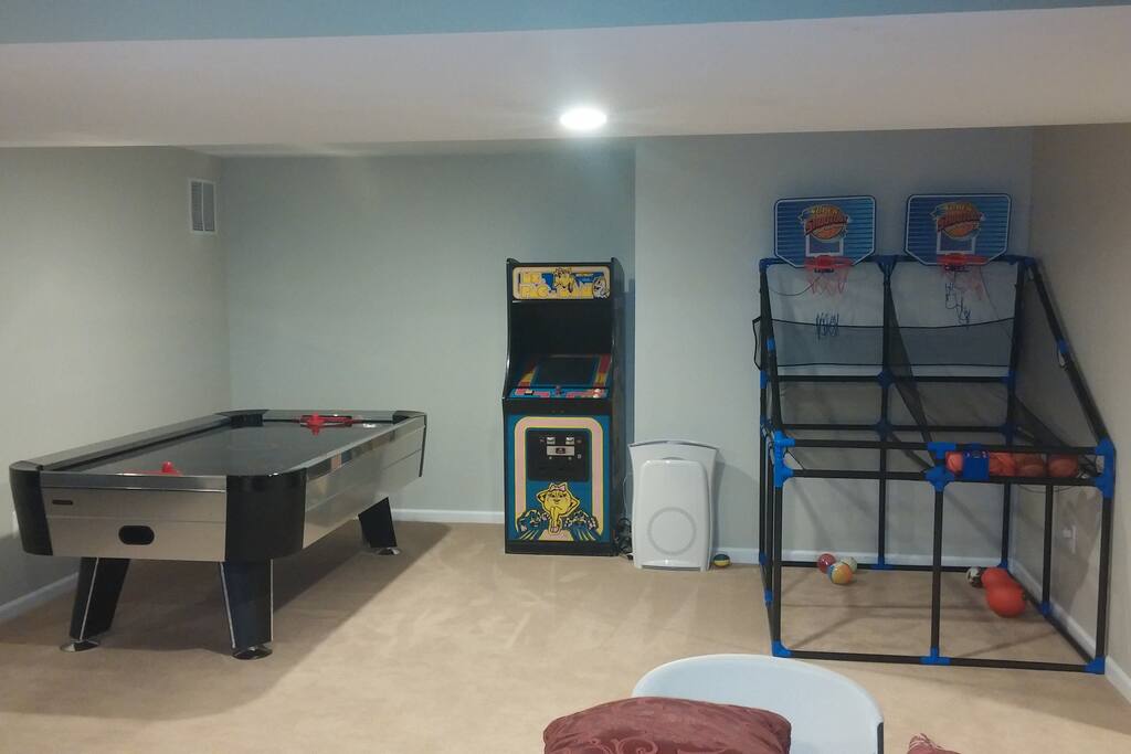Family Room game area (air hockey, Ms Packman video game, and basketball game)