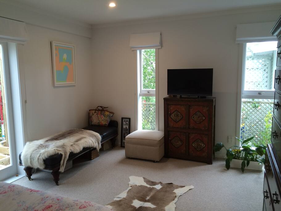 Other side of the large room. Sit on the deck with your glass of wine!