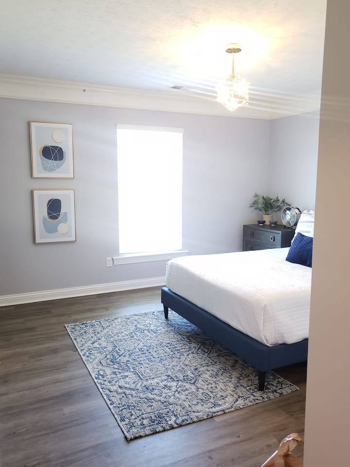 Stylish master bedroom with walk in closet 