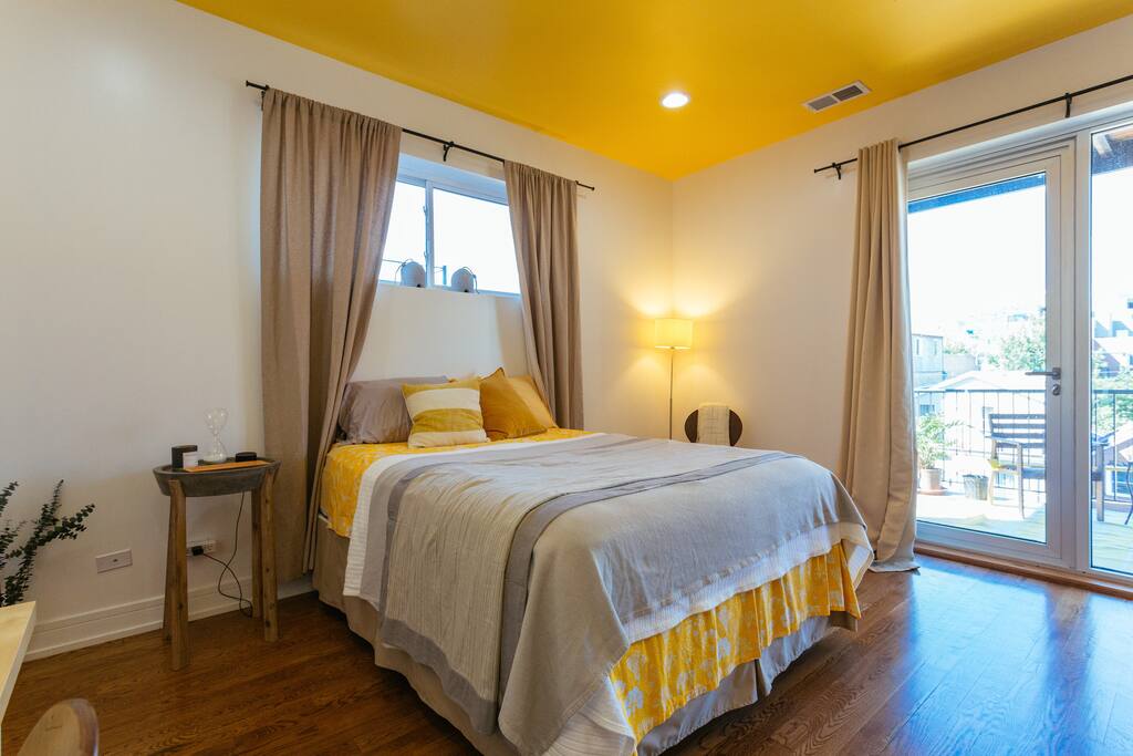 The "marigold suite" comes with a queen bed, an ensuite spa-quality bathroom, and a large deck accessible only from the bedroom.