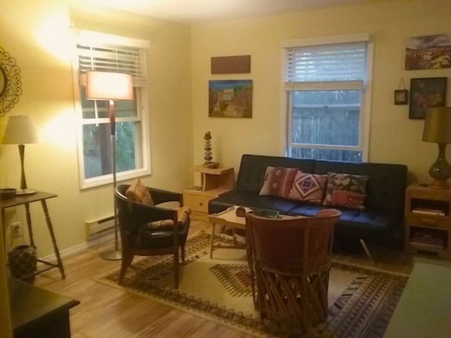 Living room has comfortable futon couch for extra guest