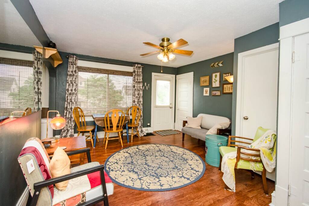 Entrance to apartment, shared living room, and breakfast nook