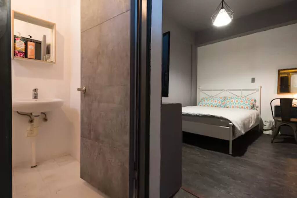 master bedroom 1 with its own bathroom attached
