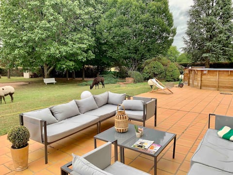 Charming house with wooded garden near village