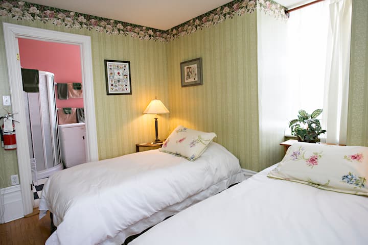 Comfortable twin beds with good reading lights.