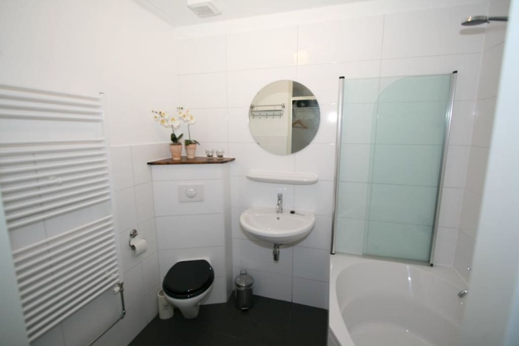 Bathroom including bath