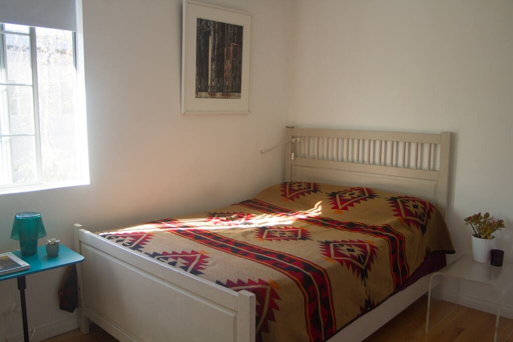 2nd Bedroom with full bed and bathroom across hall