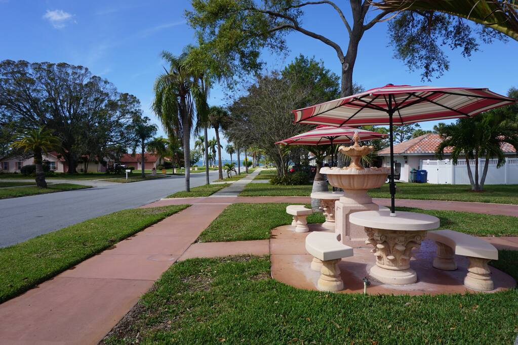 Enjoy the view of the bay from underneath the umbrellas