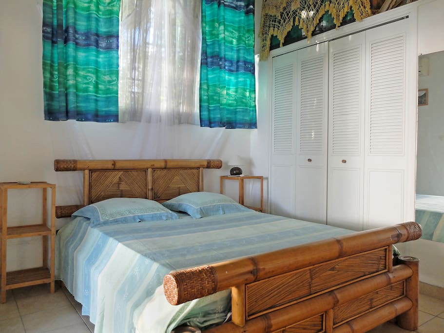 Double bed, full-length mirror and closet space