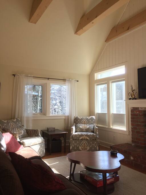 Another view of the living room. The two gray chairs are rockers.