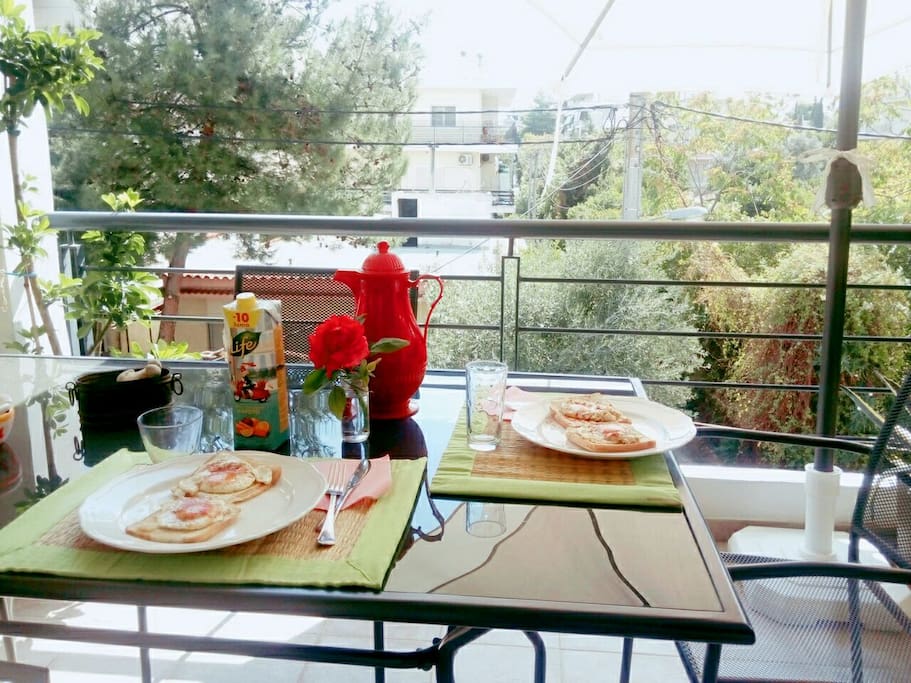 enjoy your meal at the beautiful blooming balcony