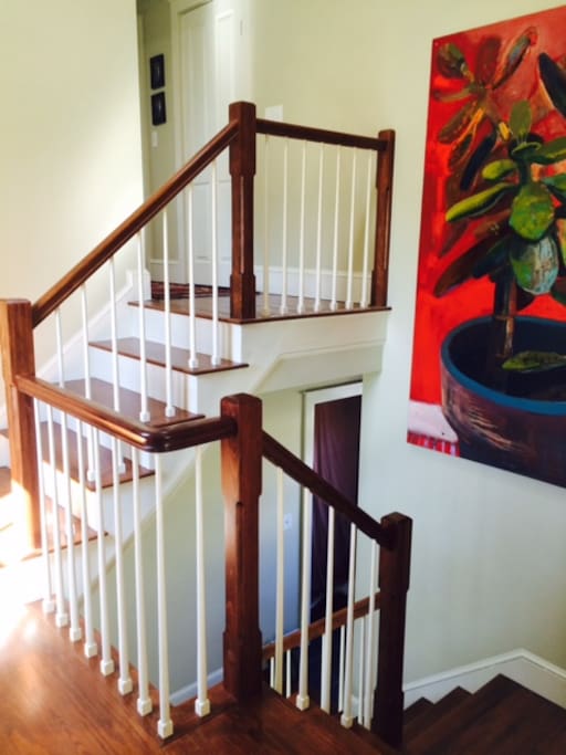 Stairwell between room for rent and master bathroom.