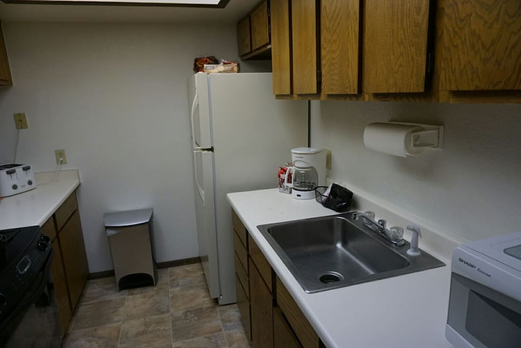 Full kitchen with various appliances.