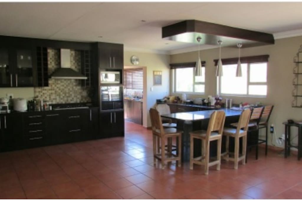 Kitchen and lounge open area.