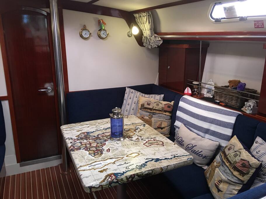 This is the saloon seating area. It seats 6 but 4 comfortably. Table folds flat to turn into a double bed.