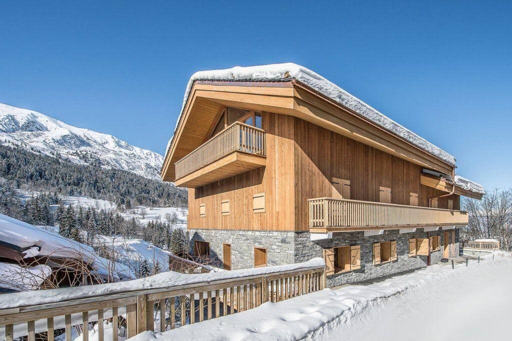 Chalet avec 4 places de parking extérieures chauffées