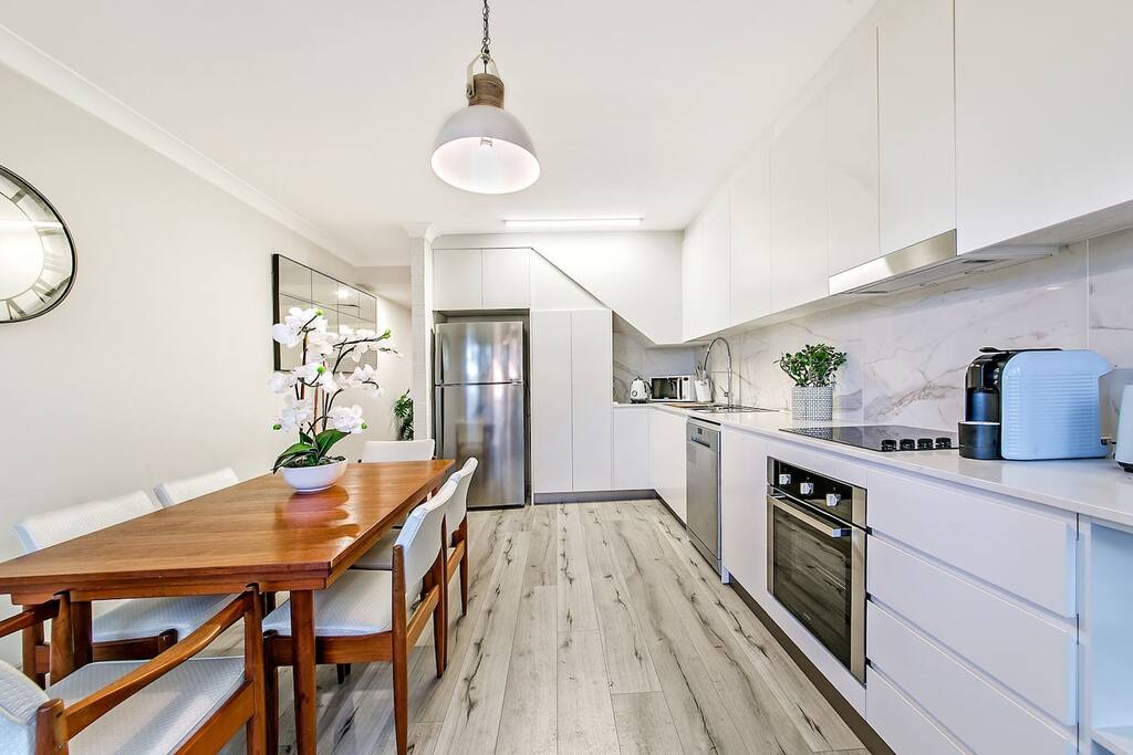 Kitchen with 6 seater dining and reverse aircon