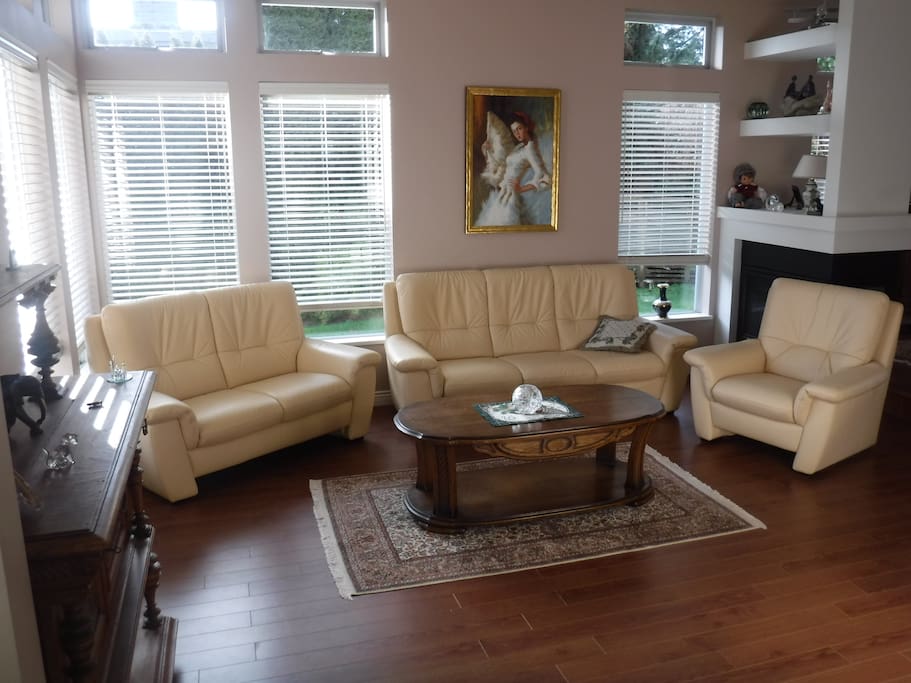 Common room with fireplace and 55" TV