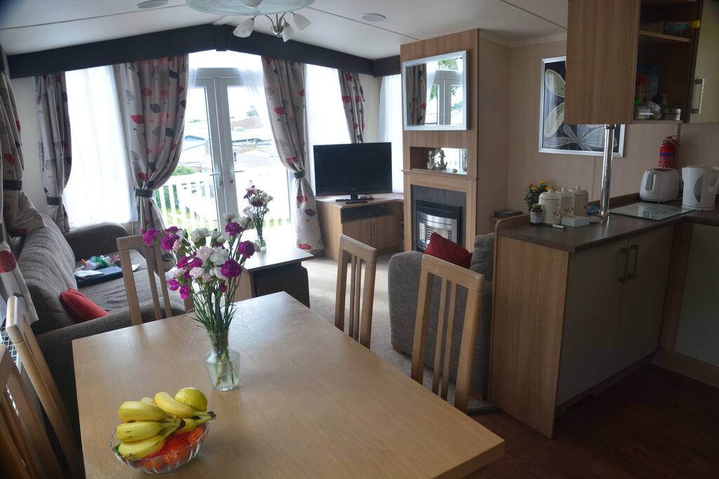 Lounge looking towards the veranda and patio doors. Showing TV and DVD player