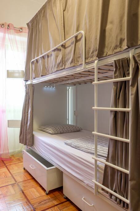 Each bed has a locker, reading light and plug in's