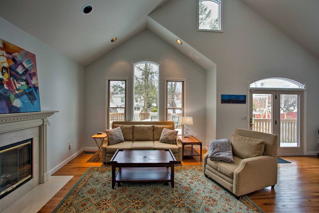 The open-concept floor plan and vaulted ceilings promote a serene ambiance throughout the home.