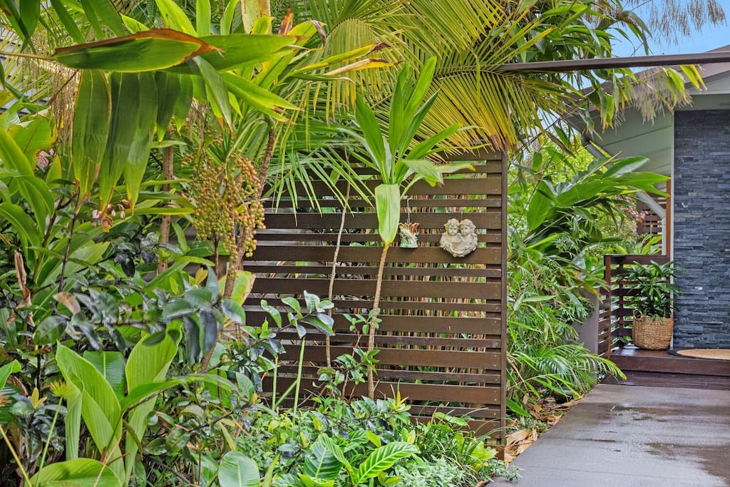 Tropical gardens and gated entrance