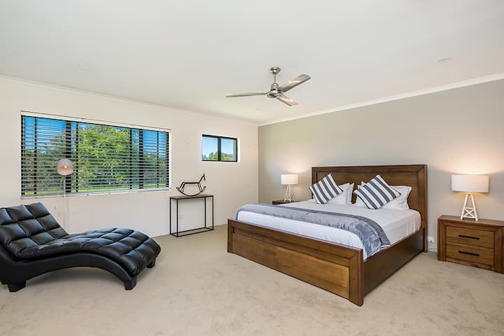 Main house master bedroom with king size bed and ensuite