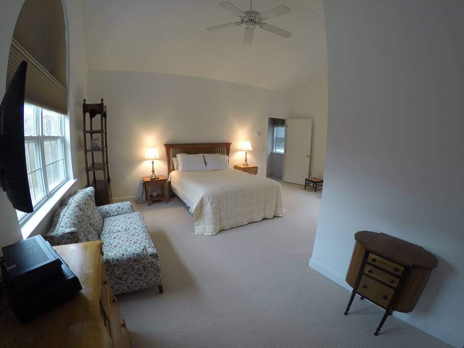 Spacious and private in the Sand Dune Suite - room darkening shades and ceiling fan.