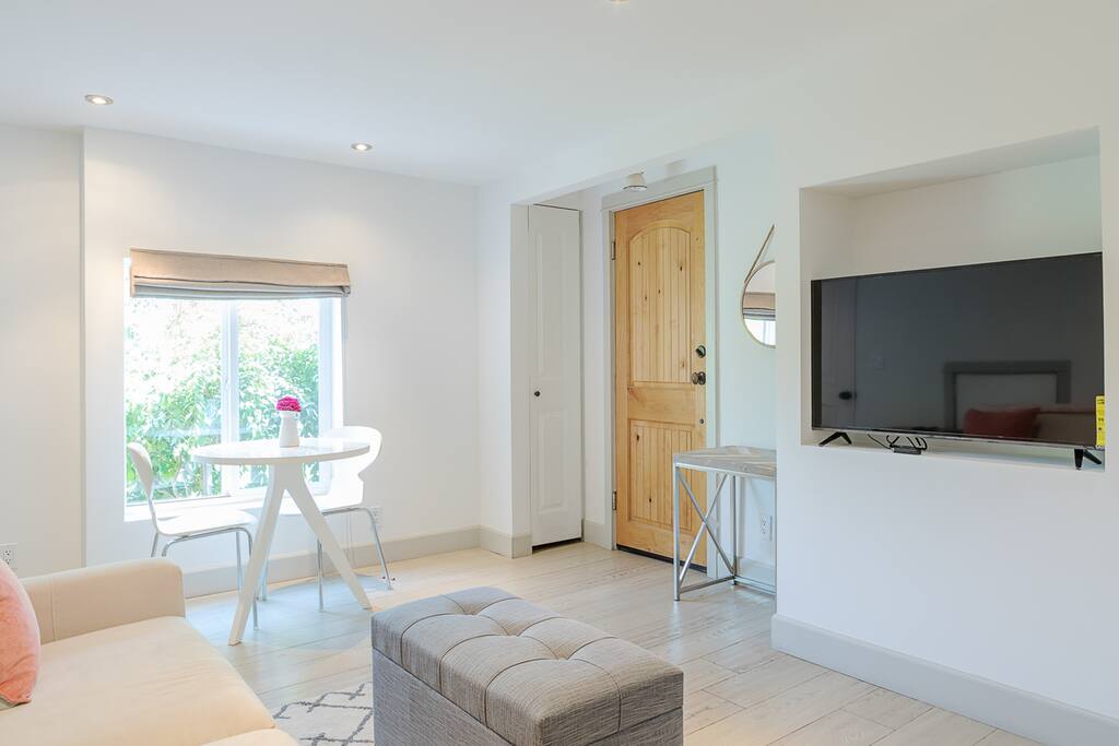 Living Room - Spectrum streaming service available. Small cafe table for enjoying coffee or a glass of wine.