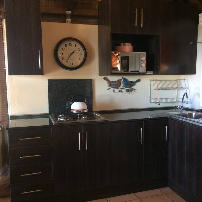 The kitchen had been refurbished with marble tops.