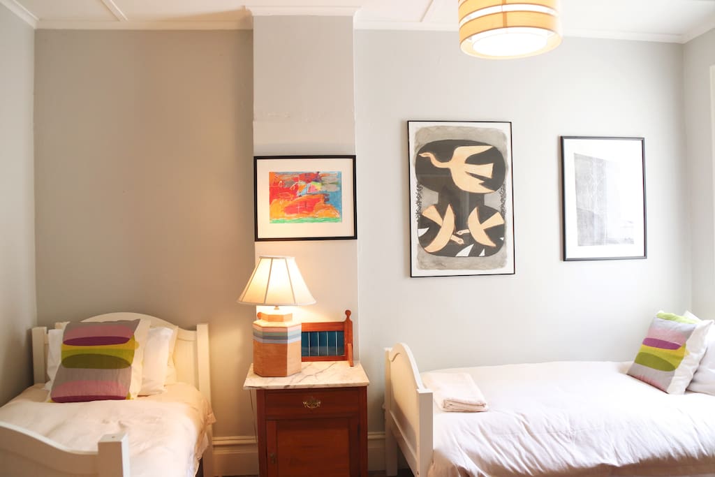 Double bedroom with 2 single beds.