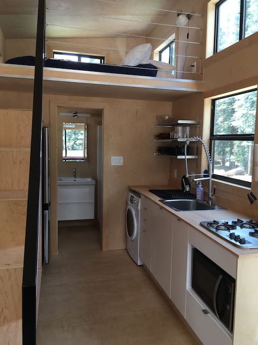 Kitchen has washer and appliances