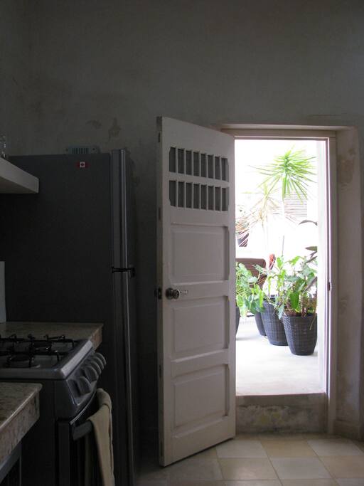 Kitchen with access to patio.