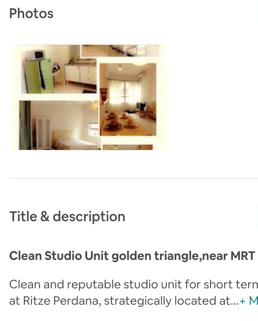 The studio unit features a cozy sleeping area with a spacious bed located near large windows, allowing natural light to fill the room. A kitchenette equipped with essential appliances, including a fridge and induction cooker, is also visible, providing convenience for guests.