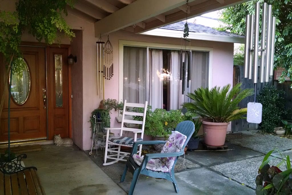 Quiet neighborhood, front porch sitting area.