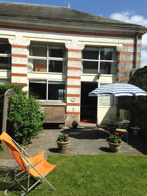 Patio and entrance of La Petite Orangerie