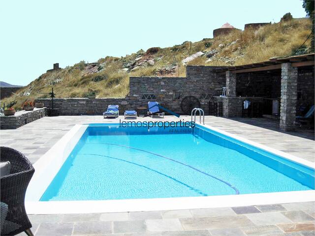 Traditional stone built windmill with a sea view gallery image 3