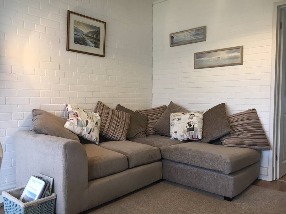 Lovely comfortable wrap around sectional sofa