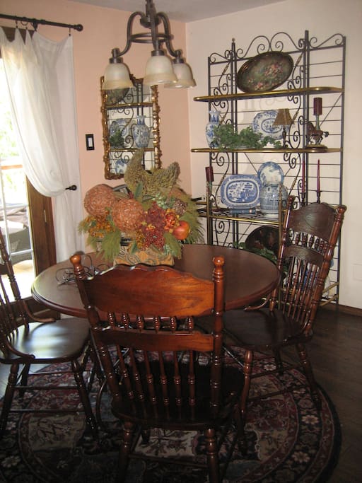 Dining room for your breakfast. Fresh air on balcony that is furnished with table and chairs. Small grill if needed located on balcony overlooking Live Oak Trees and pasture.