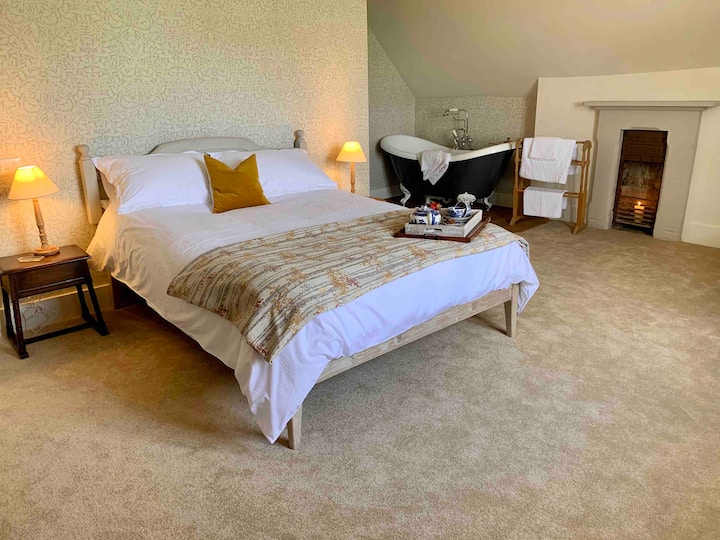 Forest view is a very special room with a king sized bed, walk-in wardrobe, free standing claw foot bath and separate WC it’s the perfect retreat at the top of the house away from it all.