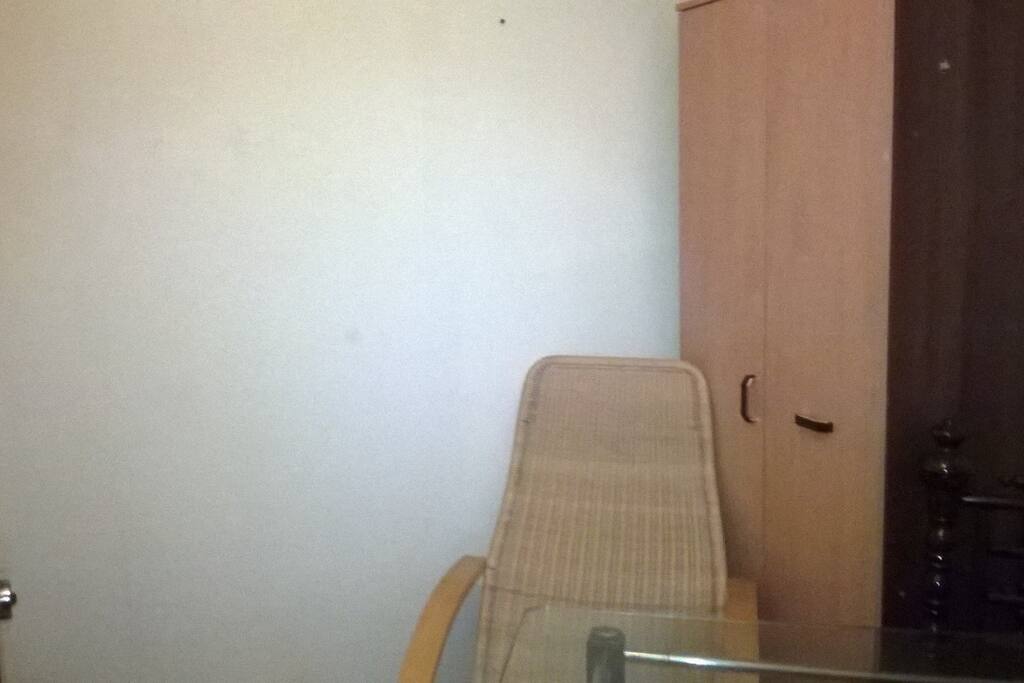 tall wardrobe and reclining chair
