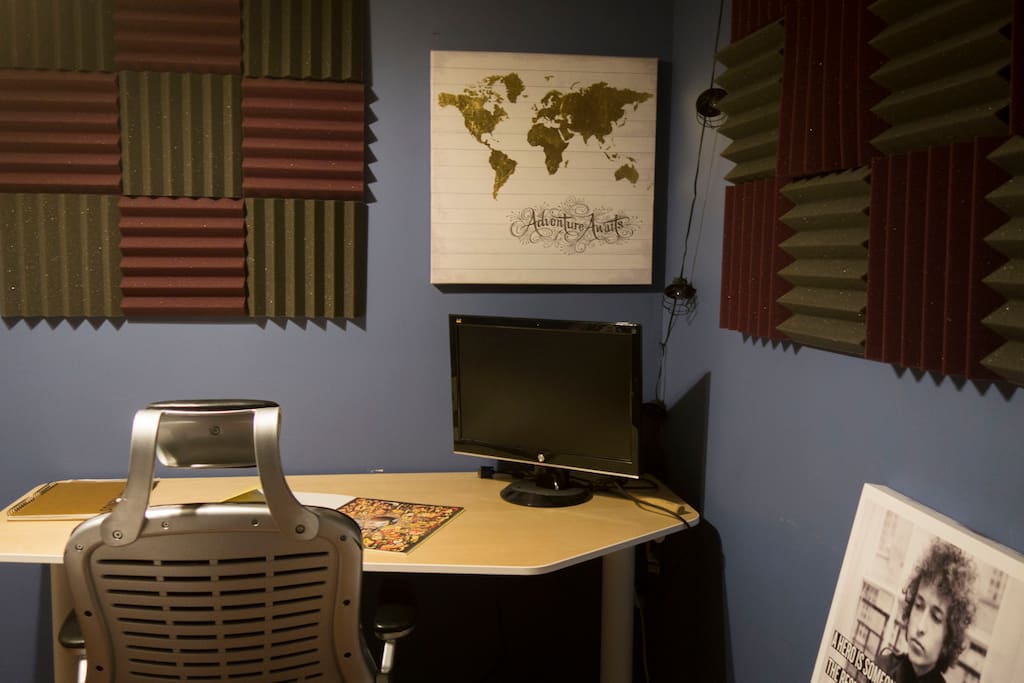 The bedroom has a desk and chair.