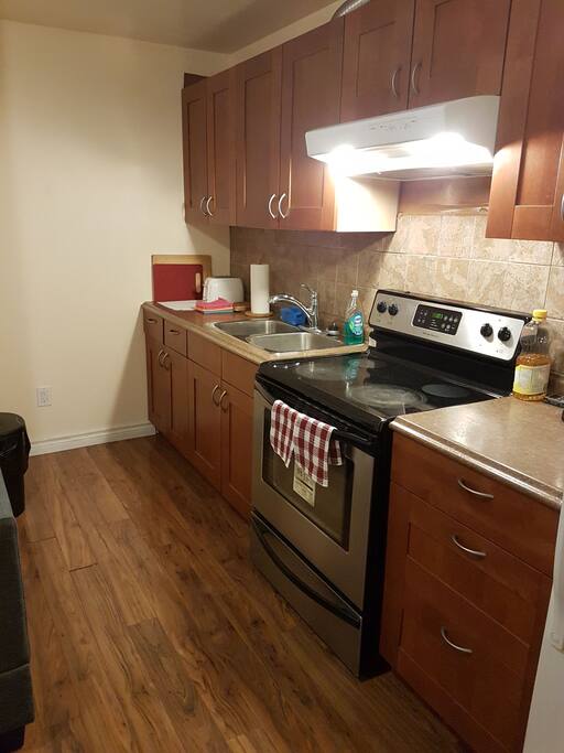 a complete kitchen with all your neccesities.