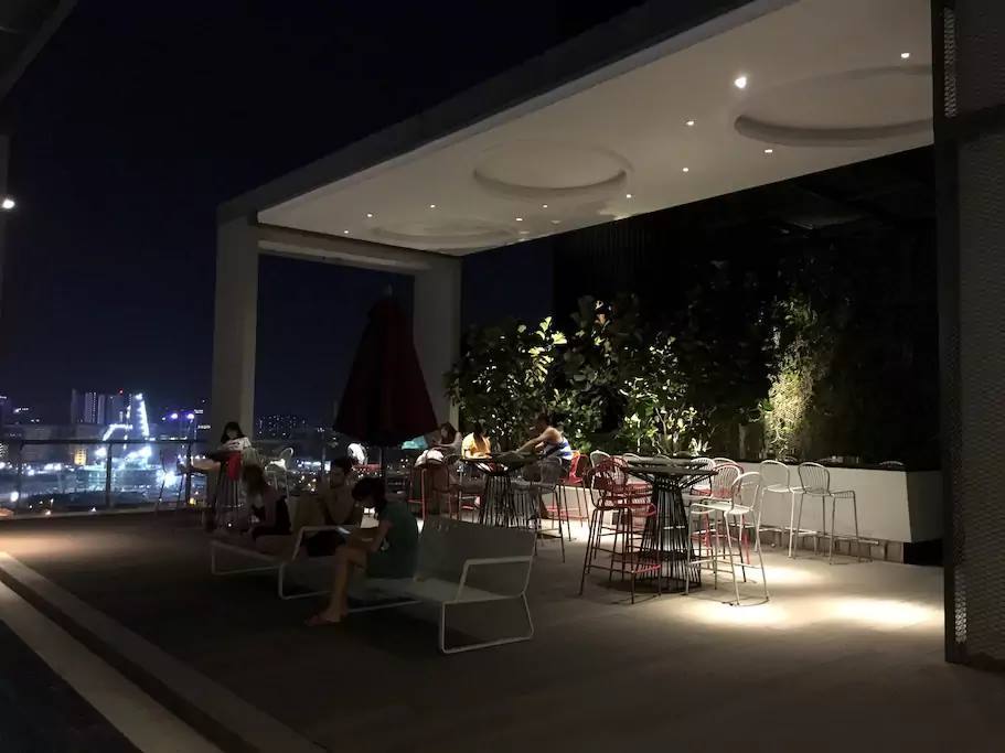 Rooftop pool city view (night)