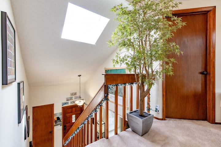 Stairs, leading from the front door to the upstairs, where the bedrooms and full bath are located.